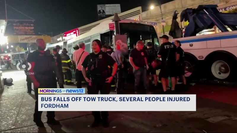Story image: Officials: MTA bus falls off tow truck, several injured in Fordham