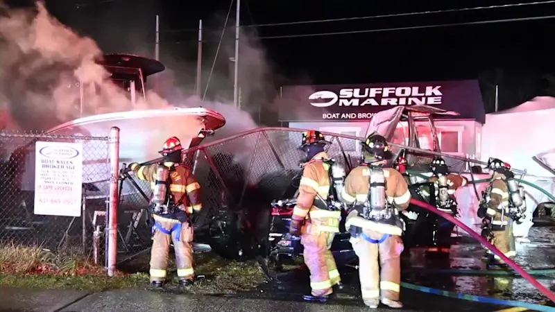 Story image: Police: Multiple boats catch fire after driver crashes into Babylon boatyard; driver charged with DWI