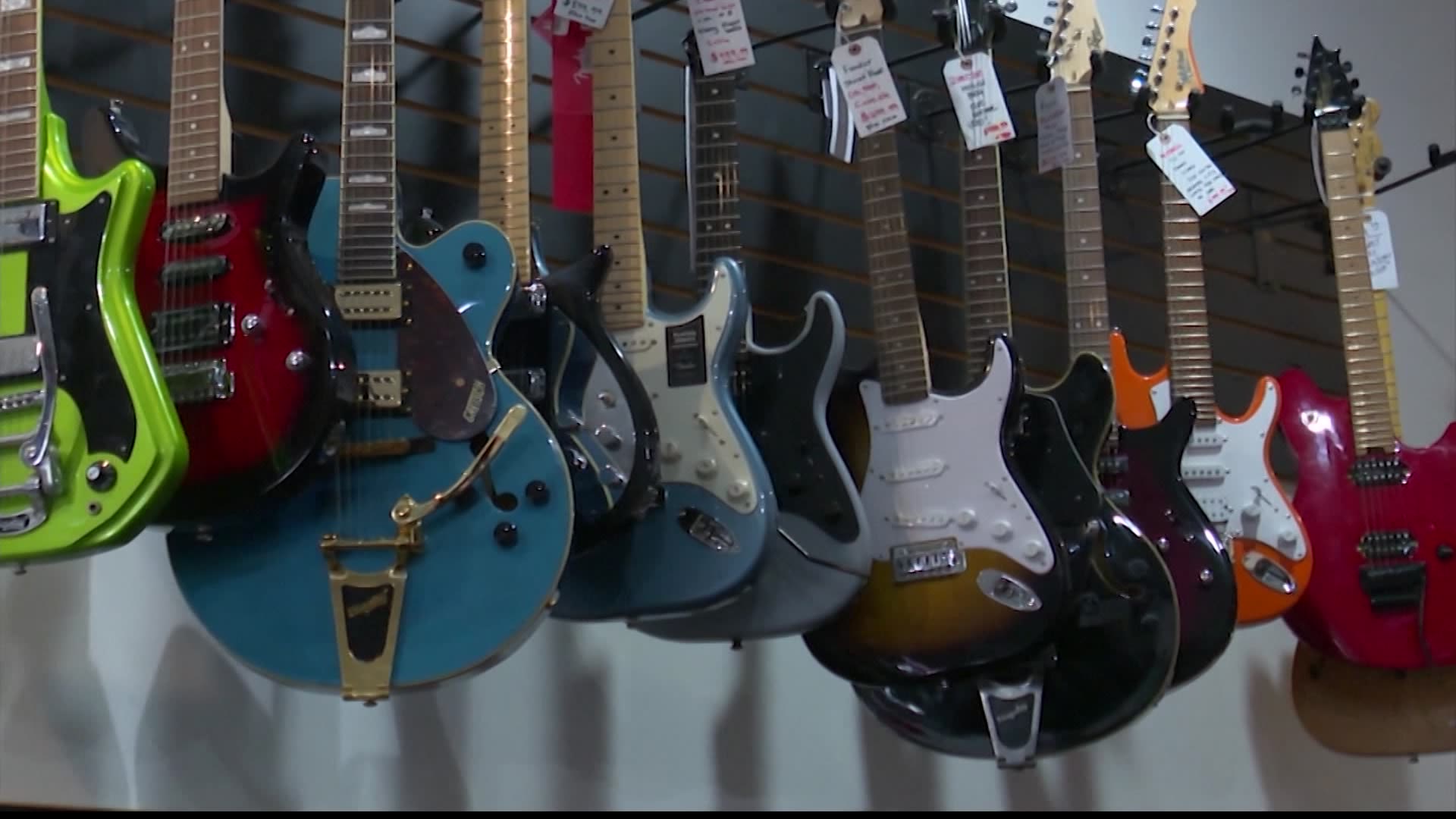 Staying in tune with business: The Rock Shop cuts ribbon on expanded ...