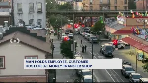 NYPD: Suspect surrenders following attempted robbery, hostage situation at Bushwick money transfer store