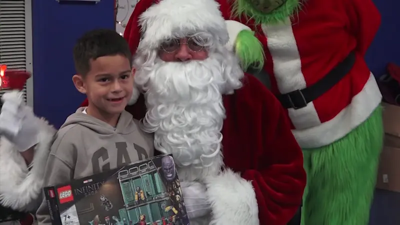 Story image: Aquebogue Elementary School in Riverhead surprises students with hundreds of holiday presents 