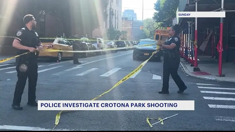 Story image: Bronx families return to Crotona Park Pool following weekend shooting