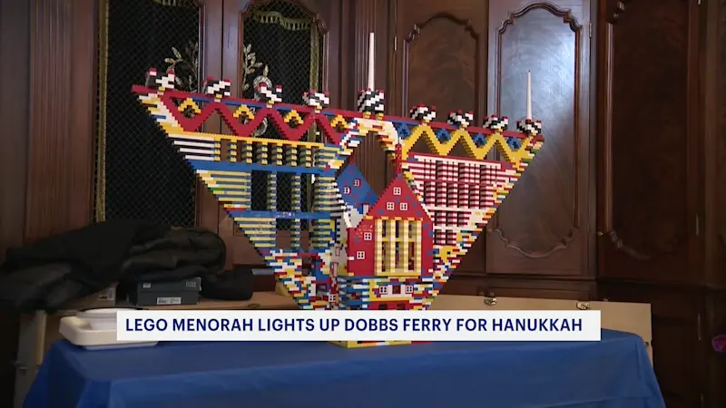 Story image: Families kick off Hanukkah by helping build 12-foot Lego menorah