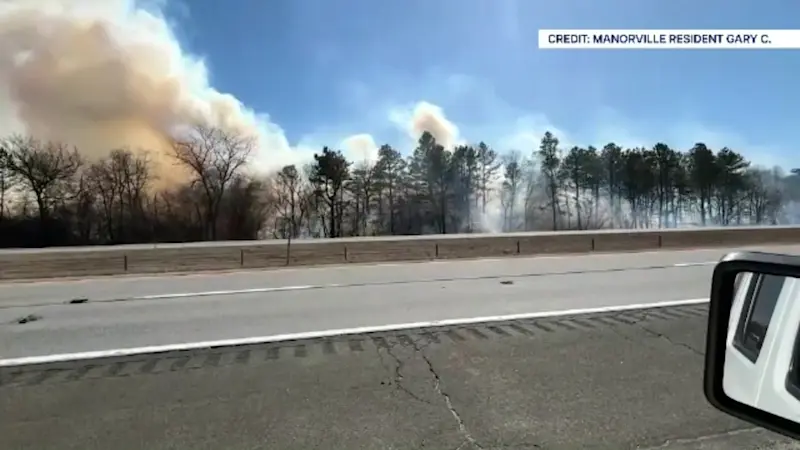 Story image: Suffolk police: East End wildfire investigation points to person trying to cook s’mores