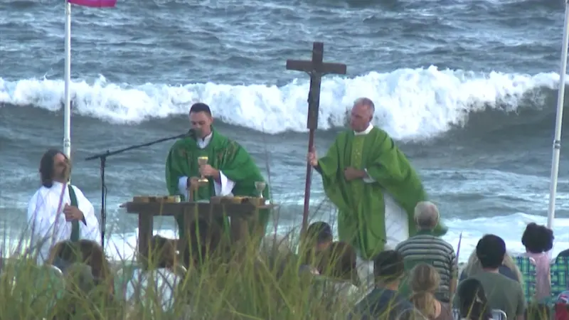 Story image: Beach Catholic dedicates final beach Mass of the summer to first responders