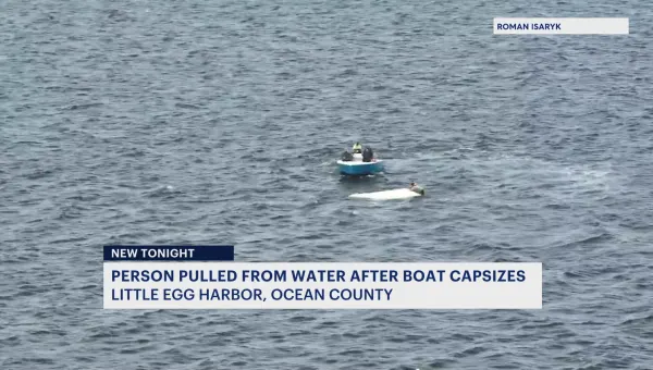 WATCH: Boaters help rescue another boater whose vessel capsized near Little Egg Harbor