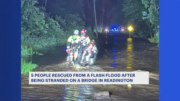 Officials: 5 people rescued from flash flooding on bridge in Readington