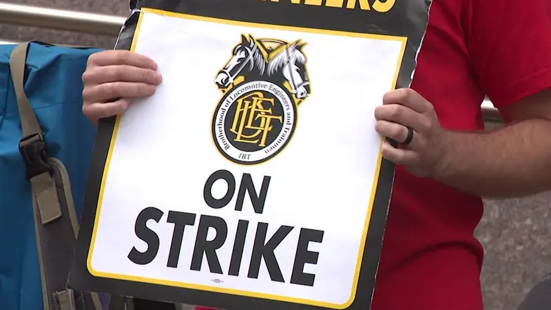 Story image: Union workers begin picketing for first rail strike in over 40 years