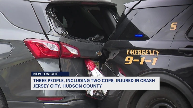 Story image: Officials: 3 people, including 2 officers, injured in car crash in Jersey City