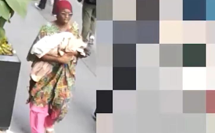 Story image: Imágenes de mujer cargando bebé que fue abandonada 