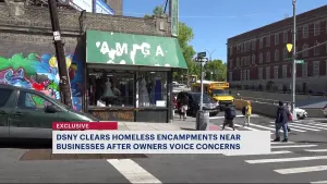 DSNY clears trash left by homeless encampment in Kingsbridge Heights after multiple complaints