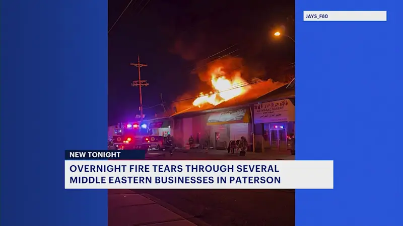 Story image: Large fire in Paterson injures 2, damages several Middle Eastern shops