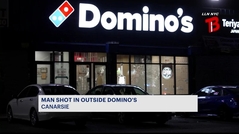 Story image: NYPD: One person injured, shooter on loose after gunfire erupts outside Domino's Pizza