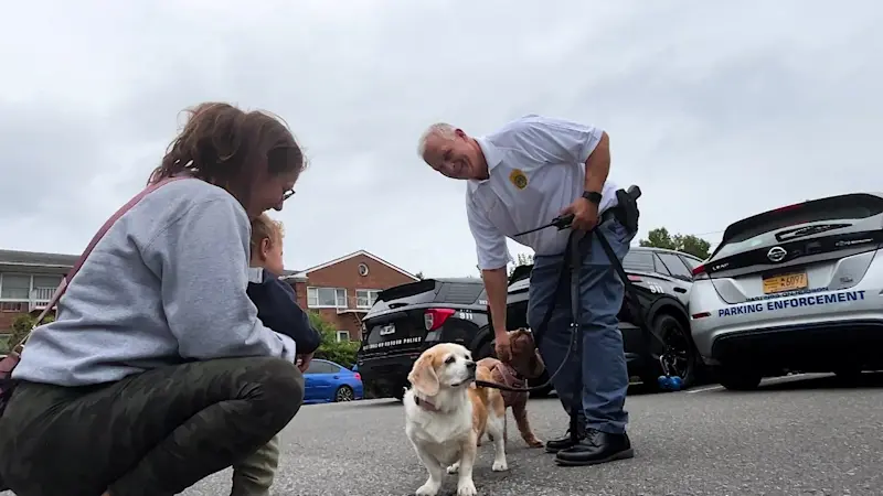 Story image: A wag and a smile: 'Cops and Cones' in Hastings helps build trust in community