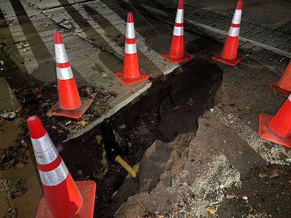 Story image: National Grid crews making repairs after storm leaves dangerously large hole in Lawrence sidewalk
