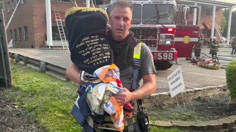 Story image: ‘It’s a miracle.’ Torah scroll saved from fire at a Greenvale synagogue