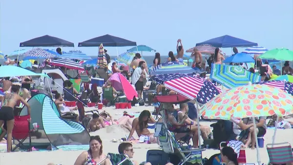 Thousands head to the beach Wednesday as temperatures soar
