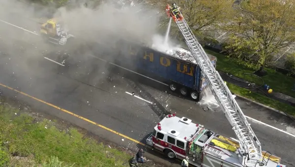 Recycling truck goes up in flames, shuts down part of Long Island Expressway 