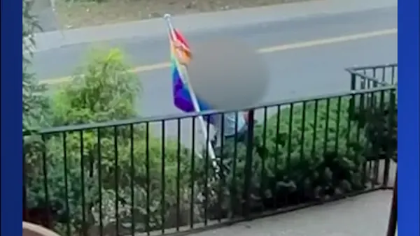 Security camera captures Pride flag being torn down from a West Harrison home 