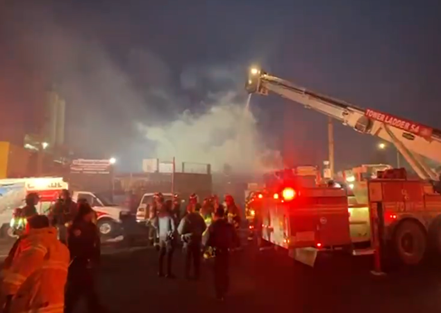 Story image: Emergency responders battle junkyard fire in Hunts Point