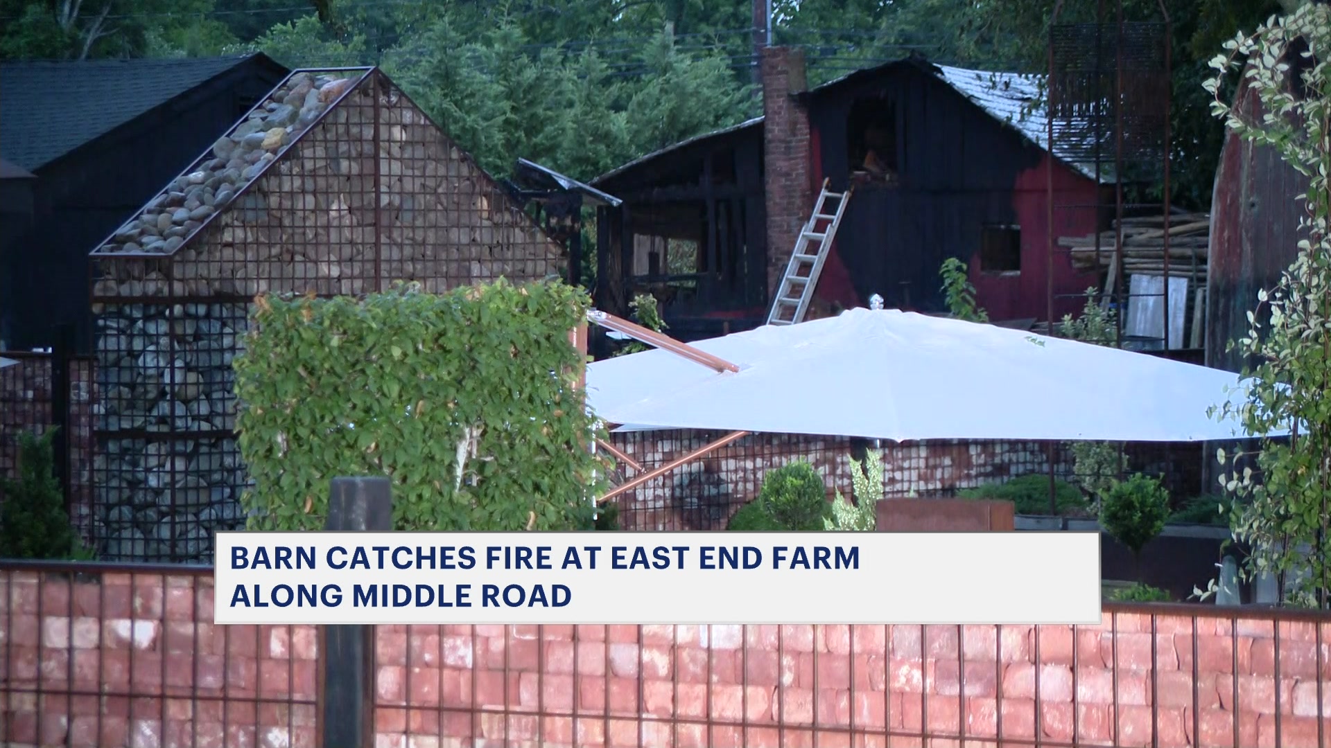 Investigation underway after barn catches fire in Peconic