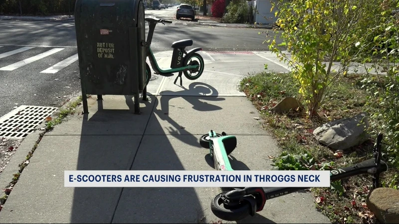 Story image: Throggs Neck neighbors say abandoned e-scooters cluttering the streets