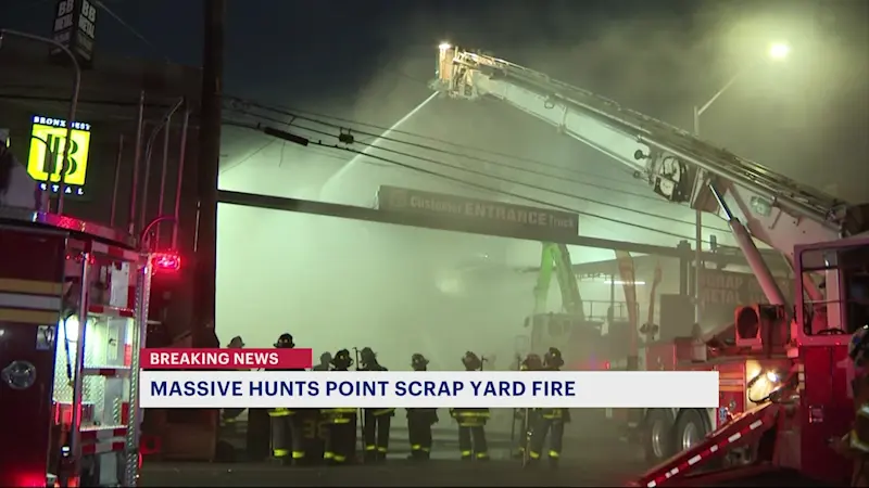 Story image: Massive scrapyard fire fills Hunts Point sky with smoke; no injuries reported