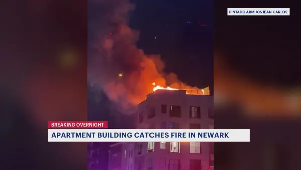 Fire breaks out at apartment building in Newark; residents work to salvage belongings 