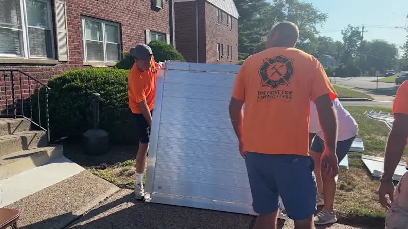 Story image: Firefighters finish wheelchair ramp for retired EMS captain in Pearl River