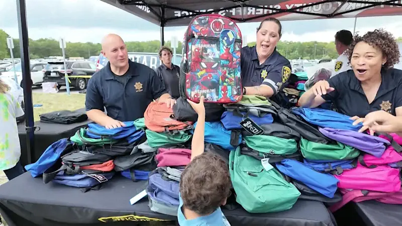 Story image: Suffolk County Sheriff’s school supply giveaway draws hundreds