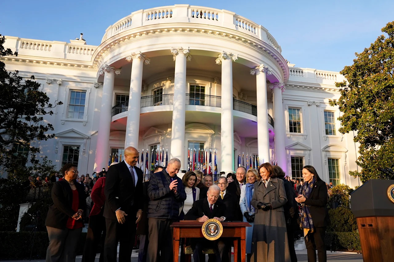 President Joe Biden signs the Respect for Marriage Act