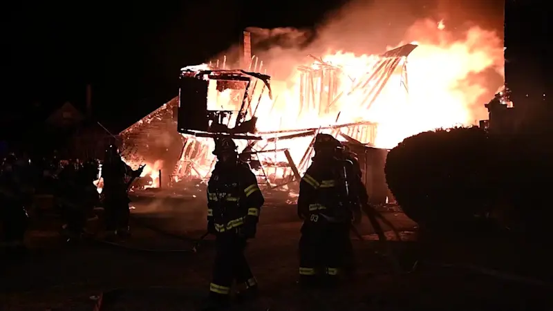 Story image: 1 woman killed in fire that ripped through 3 homes in Bay Shore, police say