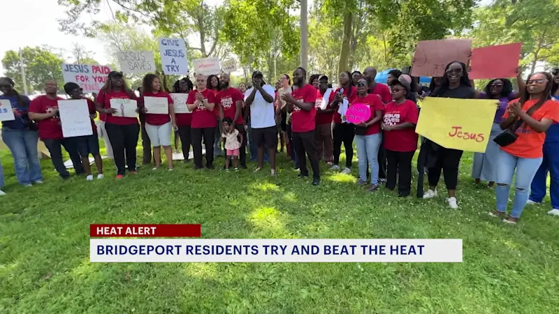 Story image: Bridgeport residents try and beat the heat amid high temps and humidity