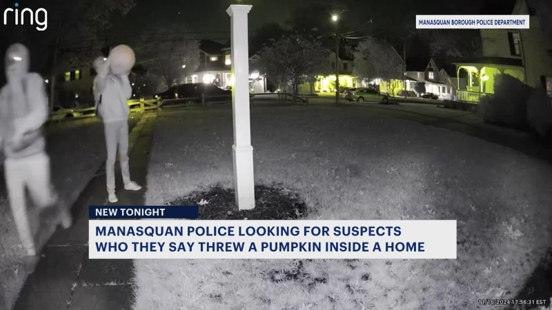 Story image: Police: 2 people caught on camera throwing pumpkin into Manasquan home