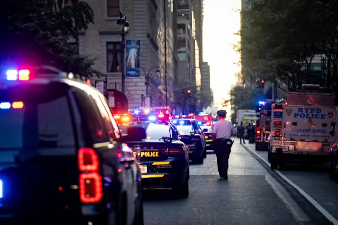 Story image: Gunman kills 4, including police officer, in shooting at New York City office tower