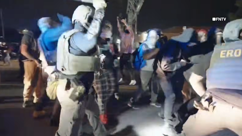 Story image: Dramatic footage show protestors clashing with agents at ICE detention facility in Newark