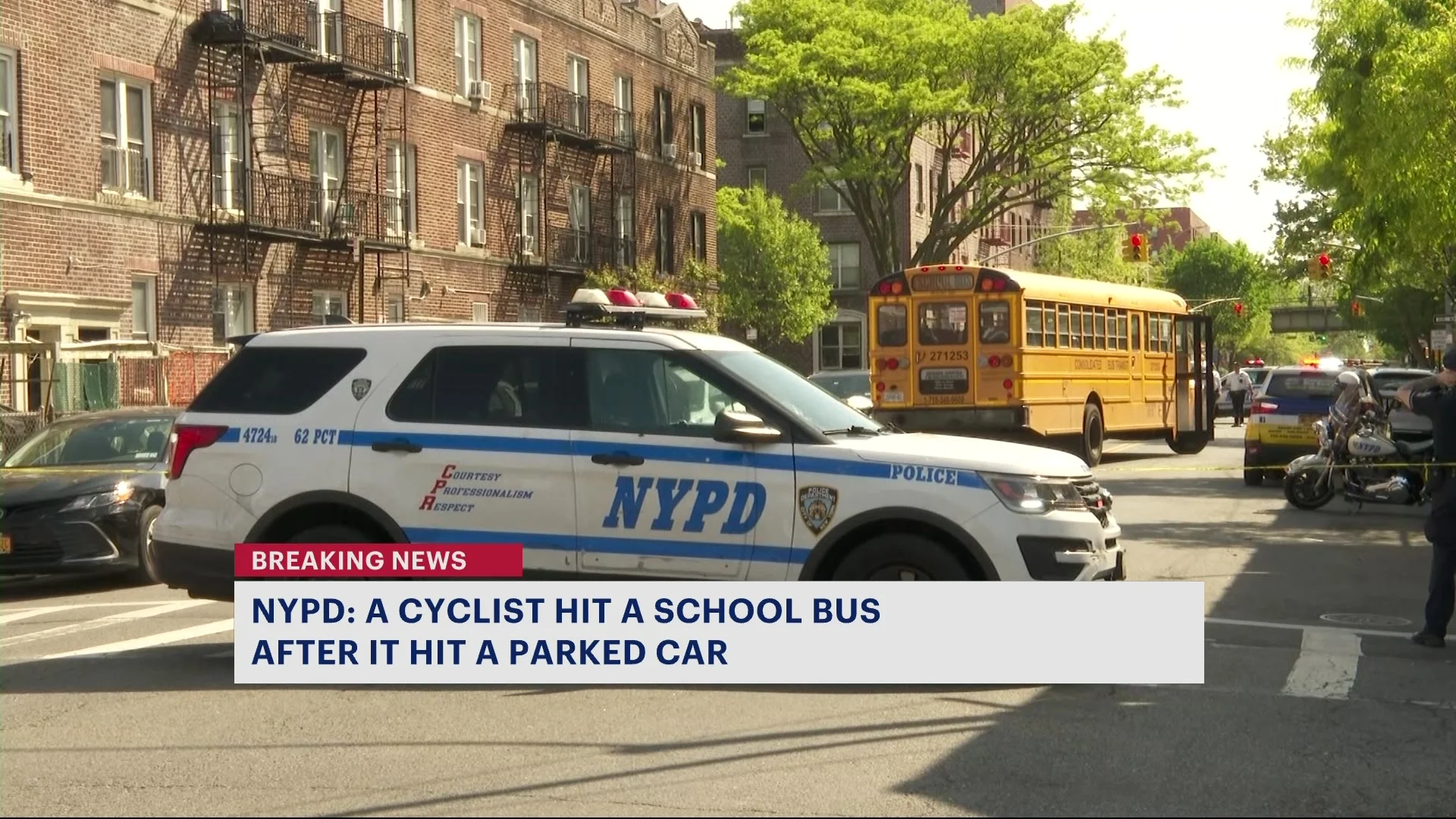 ​NYPD: Cyclist hit by car door, then run over by school bus