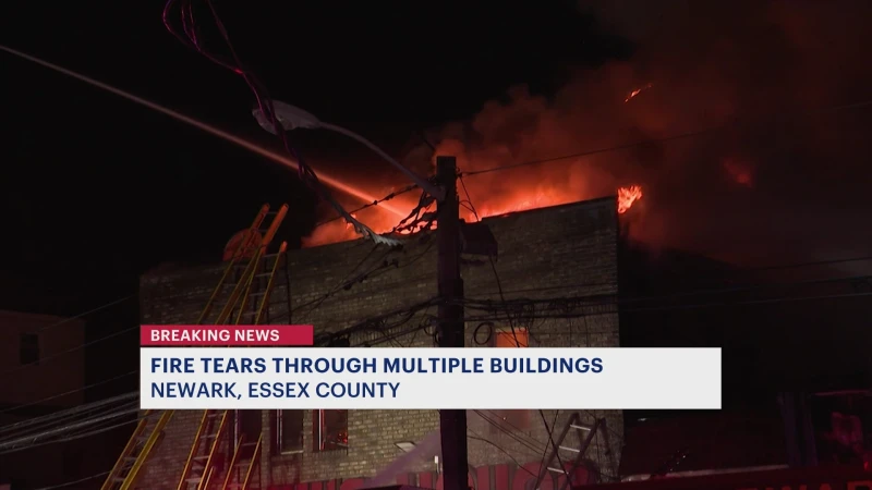 Story image: Officials: Newark fire tears through several buildings, displaces families