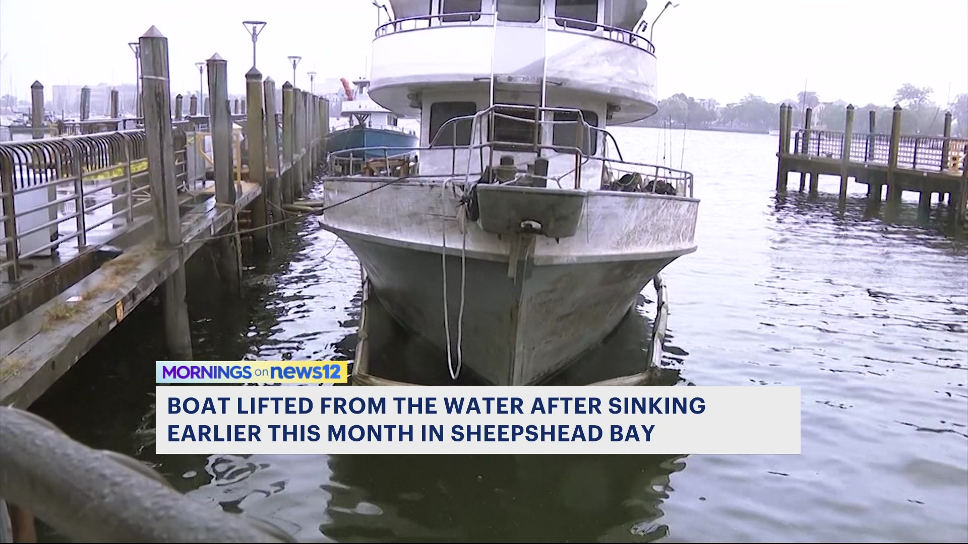 News 12 | Long Island | Sunken Boat Lifted From Sheepshead Bay Waters ...