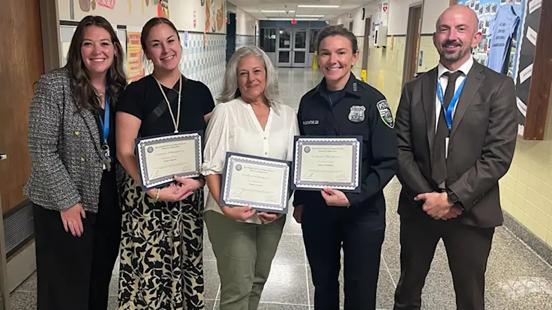 Story image: Aquebogue Elementary School staffers honored for saving student