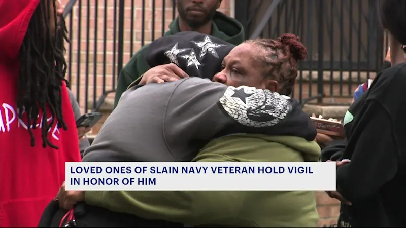 Story image: Loved ones of slain Parkchester Navy veteran hold vigil