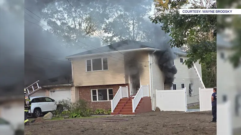 Story image: Ronkonkoma woman accused of setting house on fire with children inside