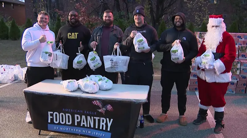 Story image: New York Giants’ Jermaine Eluemunor hosts turkey giveaway