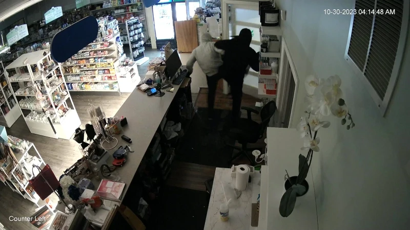 Story image: Caught on camera: Video shows people breaking into Greenwich pharmacy
