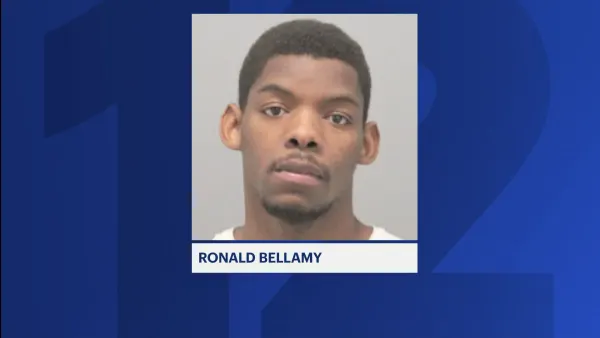 Police: Man arrested for hitting woman in face, stealing phone and purse in North Lawrence
