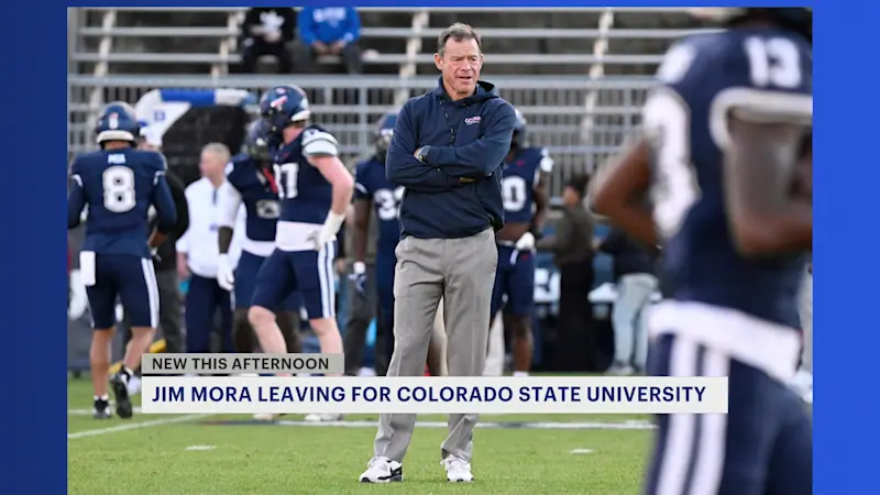 Story image:  UConn football head coach Jim Mora going to Colorado State