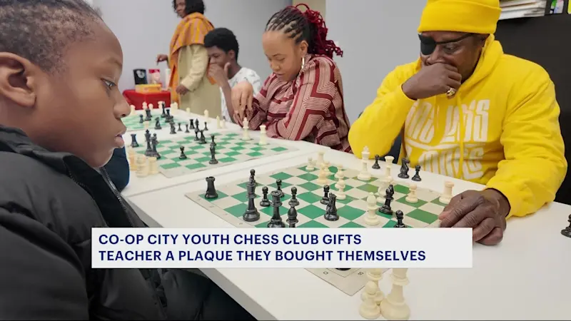 Story image: Students honor longtime Co-op City chess teacher with surprise gift