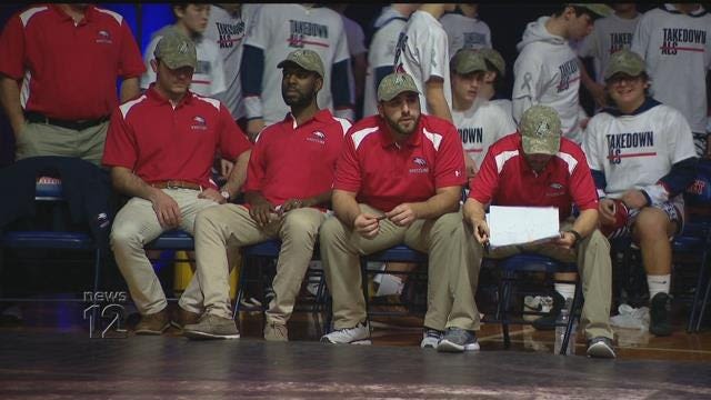 Manhasset community rallies for high school wrestling coach in the