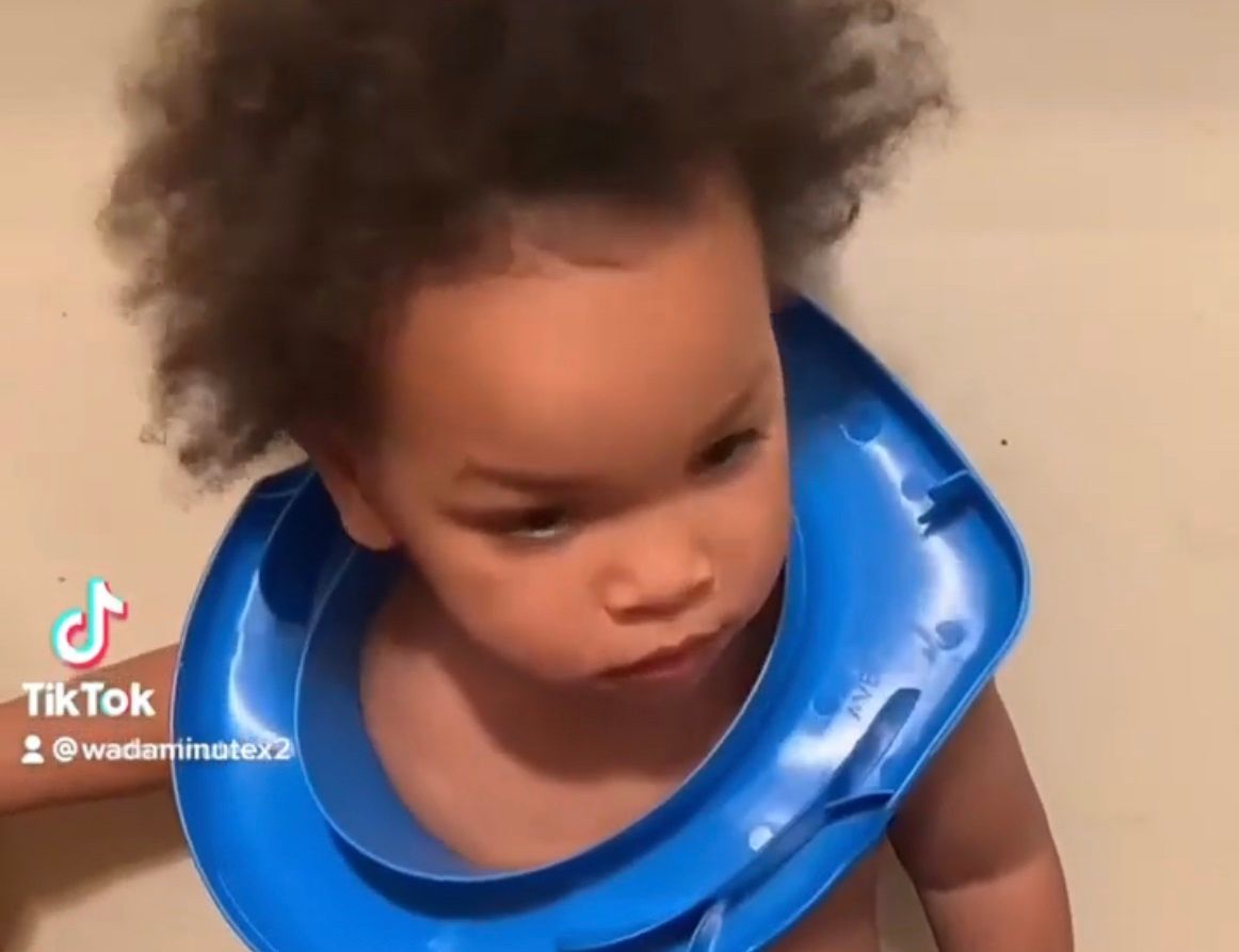 Rescuers help toddler with toilet seat stuck on his head