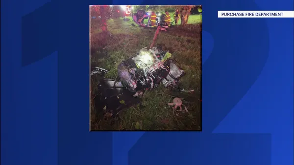 2 rescued after vehicle overturns in Purchase